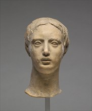 Head of a Youth; Tarentum, Taras, South Italy; 300 - 100 B.C; Terracotta with clay slip; 17.4 × 9.2 × 11.5 cm