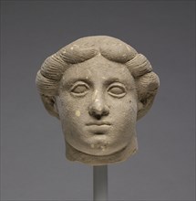 Head of a Man; Tarentum, Taras, South Italy; 425 - 400 B.C; Terracotta; 13.5 × 13.8 cm, 5 5,16 × 5 7,16 in