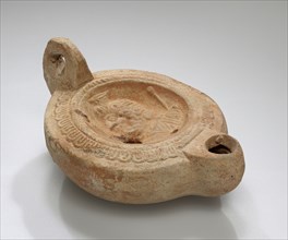 Lamp; Roman Empire; 2nd - 3rd century; Terracotta; 9.7 x 4.5 x 7.1 cm, 3 13,16 x 1 3,4 x 2 13,16 in