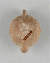 Lamp; Roman Empire; 2nd - 3rd century; Terracotta; 9.7 x 4.5 x 7.1 cm, 3 13,16 x 1 3,4 x 2 13,16 in