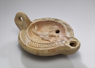 Lamp; North Africa, Tunisia; 2nd - 3rd century; Terracotta; 12.2 x 4.4 x 8.7 cm, 4 13,16 x 1 3,4 x 3 7,16 in