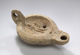 Lamp; North Africa, Tunisia; 1st - 2nd century; Terracotta; 12.2 x 4.9 x 7 cm, 4 13,16 x 1 15,16 x 2 3,4 in