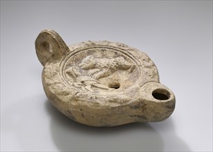 Lamp; North Africa, Tunisia; 2nd - 3rd century; Terracotta; 11.1 x 5.2 x 7.7 cm, 4 3,8 x 2 1,16 x 3 1,16 in