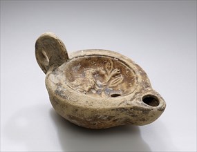 Lamp; Italy; late 1st - early 2nd century; Terracotta; 4.2 × 5.6 × 8.4 cm, 1 5,8 × 2 3,16 × 3 5,16 in