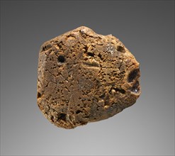 Pendant: Female Head in Profile; Italy; 425 - 400 B.C; Amber; 51 × 51 × 15.5 mm, 2 × 2 × 5,8 in