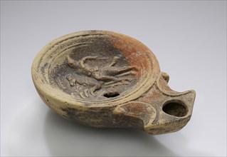 Lamp, North Africa; 1st - 4th century; Terracotta; 2.7 x 7.5 x 10.3 cm, 1 1,16 x 2 15,16 x 4 1,16 in