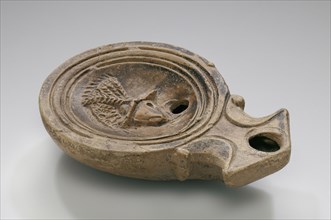 Lamp, North Africa, Tunisia; 1st - 4th century; Terracotta; 2.2 x 6.7 x 9.2 cm, 7,8 x 2 5,8 x 3 5,8 in