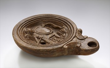 Lamp, North Africa; 1st - 4th century; Terracotta; 2.5 x 8.9 x 12.2 cm, 1 x 3 1,2 x 4 13,16 in