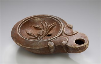 Lamp, North Africa; 1st - 4th century; Terracotta; 3 x 8 x 11.5 cm, 1 3,16 x 3 1,8 x 4 1,2 in
