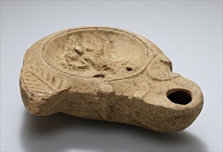 Lamp, North Africa; 1st - 4th century; Terracotta; 2.9 × 8.6 × 10.5 cm, 1 1,8 × 3 3,8 × 4 1,8 in