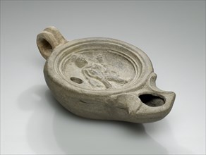 Lamp, North Africa; 1st - 4th century; Terracotta; 3 x 6.8 x 11.5 cm, 1 3,16 x 2 11,16 x 4 1,2 in
