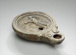 Lamp, North Africa; 1st - 4th century; Terracotta; 2.5 x 7.1 x 10 cm, 1 x 2 13,16 x 3 15,16 in