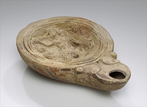 Lamp, North Africa; 1st - 4th century; Terracotta; 2.7 x 9 x 12.5 cm, 1 1,16 x 3 9,16 x 4 15,16 in