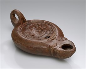 Lamp, North Africa; 1st - 4th century; Terracotta; 2.7 x 8 x 11 cm, 1 1,16 x 3 1,8 x 4 5,16 in