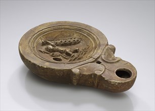 Lamp, North Africa; 1st - 4th century; Terracotta; 2.3 x 7.6 x 11 cm, 7,8 x 3 x 4 5,16 in