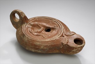 Lamp, North Africa; 1st - 4th century; Terracotta; 3 x 7.8 x 12.1 cm, 1 3,16 x 3 1,16 x 4 3,4 in