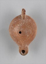 Lamp, Asia Minor; 1st - 4th century; Terracotta; 2.4 x 6.6 x 10.8 cm, 15,16 x 2 5,8 x 4 1,4 in