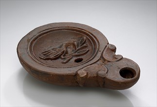 Lamp, North Africa; 1st - 4th century; Terracotta; 2.4 x 7.7 x 11 cm, 15,16 x 3 1,16 x 4 5,16 in