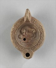 Lamp, North Africa; 1st - 4th century; Terracotta; 3 x 8 x 11.2 cm, 1 3,16 x 3 1,8 x 4 7,16 in