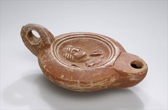 Lamp, North Africa; 1st - 4th century; Terracotta; 2.2 x 7.2 x 10.5 cm, 7,8 x 2 13,16 x 4 1,8 in