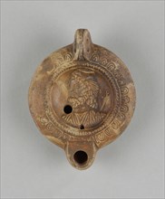 Lamp, Asia Minor; 1st - 4th century; Terracotta; 7.6 x 1.4 x 8.8 cm, 3 x 9,16 x 3 7,16 in