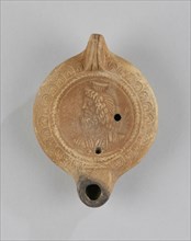 Lamp, North Africa; 1st - 4th century; Terracotta; 3 x 8.5 x 12 cm, 1 3,16 x 3 3,8 x 4 3,4 in