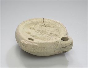 Lamp, South Anatolia, Anatolia; 1st - 4th century; Terracotta; 2.3 x 6.8 x 7.3 cm, 7,8 x 2 11,16 x 2 7,8 in