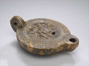 Lamp, North Africa; 1st - 4th century; Terracotta; 2.6 x 8.2 x 11.5 cm, 1 x 3 1,4 x 4 1,2 in