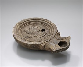 Lamp, Roman Empire; 1st century B.C. - 4th century A.D; Terracotta; 2.4 x 7.8 x 10.8 cm, 15,16 x 3 1,16 x 4 1,4 in