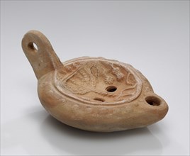 Lamp, Asia Minor; 1st - 4th century; Terracotta; 1.9 × 6 × 8.5 cm, 3,4 × 2 3,8 × 3 3,8 in