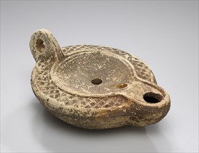 Lamp, North Africa; 1st - 4th century; Terracotta; 2.6 x 7.3 x 10 cm, 1 x 2 7,8 x 3 15,16 in