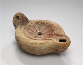 Lamp, North Africa; 1st - 4th century; Terracotta; 2.6 x 7.1 x 10 cm, 1 x 2 13,16 x 3 15,16 in