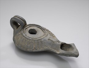 Lamp, Ephesos, ?, Central Anatolia, Anatolia; 2nd - 1st century B.C; Terracotta; 2 x 5.5 x 10.5 cm, 13,16 x 2 3,16 x 4 1,8 in