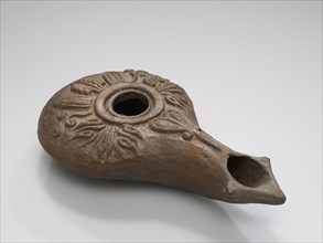 Lamp, Central Anatolia, Anatolia; 3rd - 2nd century B.C; Terracotta; 3.2 x 6.5 x 11.4 cm, 1 1,4 x 2 9,16 x 4 1,2 in