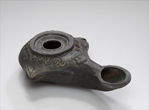 Lamp, South Anatolia, Anatolia; 2nd - 1st century B.C; Terracotta; 3 × 7 × 10.5 cm, 1 3,16 × 2 3,4 × 4 1,8 in