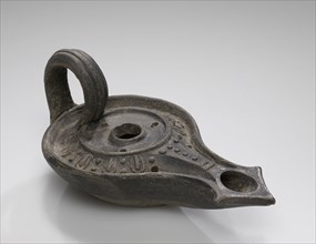 Lamp, Central Anatolia, Anatolia; 2nd century B.C; Terracotta; 2.4 × 6.5 × 12 cm, 15,16 × 2 9,16 × 4 3,4 in