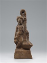 Lamp, Roman Empire; 1st century B.C. - 4th century A.D; Terracotta; 6.4 x 3.4 x 16.5 cm, 2 1,2 x 1 5,16 x 6 1,2 in