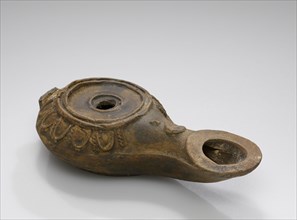 Lamp, Anatolia; 1st century B.C; Terracotta; 3.3 × 5.6 × 11 cm, 1 5,16 × 2 3,16 × 4 5,16 in