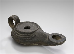 Lamp, Central Anatolia, Anatolia; 2nd - 1st century B.C; Terracotta; 3.5 × 6.5 × 13.3 cm, 1 3,8 × 2 9,16 × 5 1,4 in