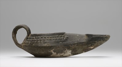 Lamp, Central Anatolia, Anatolia; 2nd - 1st century B.C; Terracotta; 3.5 × 6.5 × 13.3 cm, 1 3,8 × 2 9,16 × 5 1,4 in