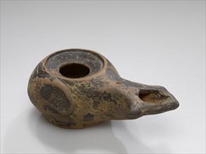 Lamp, Central Anatolia, Anatolia; 3rd - 2nd century B.C; Terracotta; 3.2 × 5.2 × 9 cm, 1 1,4 × 2 1,16 × 3 9,16 in