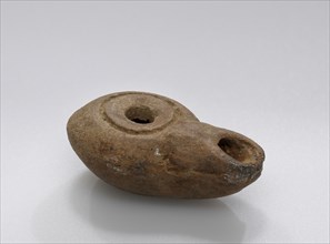 Lamp, South Anatolia, Anatolia; 4th - 3rd century B.C; Terracotta; 1.5 × 2.2 × 3.8 cm, 9,16 × 7,8 × 1 1,2 in