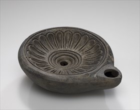 Lamp, Central Anatolia, Anatolia; 1st - 2nd century; Terracotta; 3 x 8.2 x 9.8 cm, 1 3,16 x 3 1,4 x 3 7,8 in