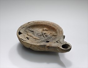 Lamp, Roman Empire; 1st century B.C. - 4th century A.D; Terracotta; 10.5 x 2.4 x 7.6 cm, 4 1,8 x 15,16 x 3 in