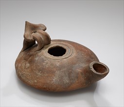 Lamp, Roman Empire; 4th - 1st century B.C; Terracotta; 2.6 x 9.4 x 11 cm, 1 x 3 11,16 x 4 5,16 in