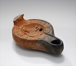 Lamp, Roman Empire; 1st century B.C. - 5th century A.D; Terracotta; 15 x 4.7 x 9.2 cm, 5 7,8 x 1 7,8 x 3 5,8 in