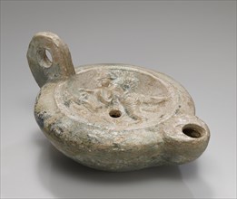 Lamp, Asia Minor; 1st century B.C. - 4th century A.D; Terracotta with green glaze; 3.2 × 8.9 × 12.2 cm