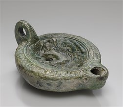 Lamp, Roman Empire; 1st century B.C. - 4th century A.D; Terracotta with green glaze; 3.2 x 9 x 12 cm, 1 1,4 x 3 9,16 x 4 3,4 in