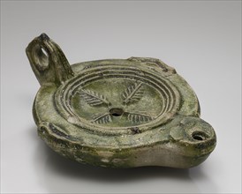 Lamp, Mainz, Germany; 1st century B.C. - 4th century A.D; Terracotta with green glaze; 3.2 x 10.5 x 13.1 cm