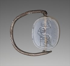 Engraved scaraboid gem inset into a ring; about 470 B.C; Ring: silver; gem: blue chalcedony; 1.7 × 1.4 × 0.8 cm
